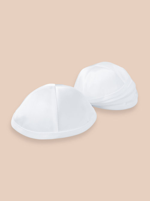 Two blank white satin kippahs